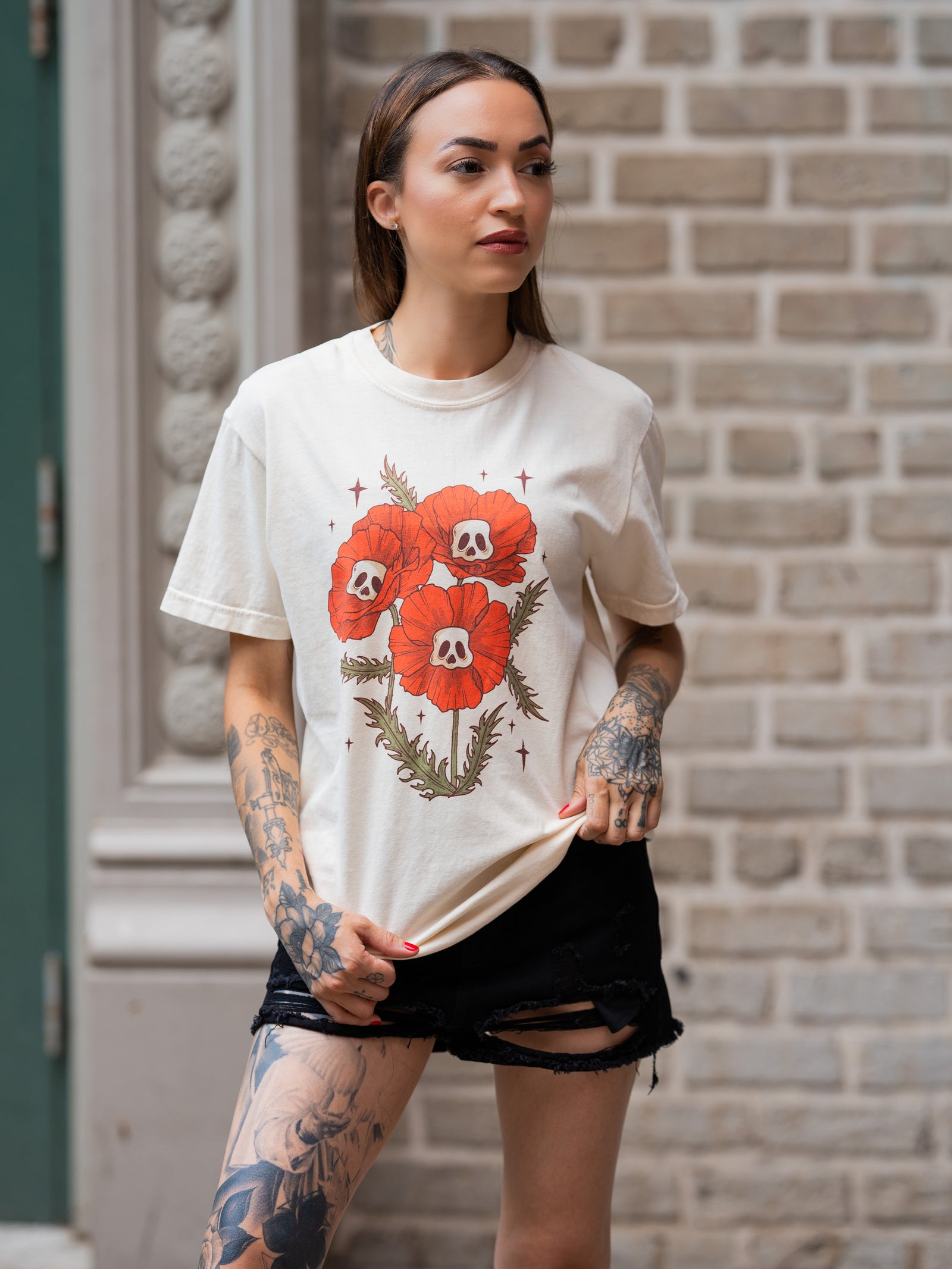 Janice Danger wearing a unisex, off white skull flowers t-shirt 