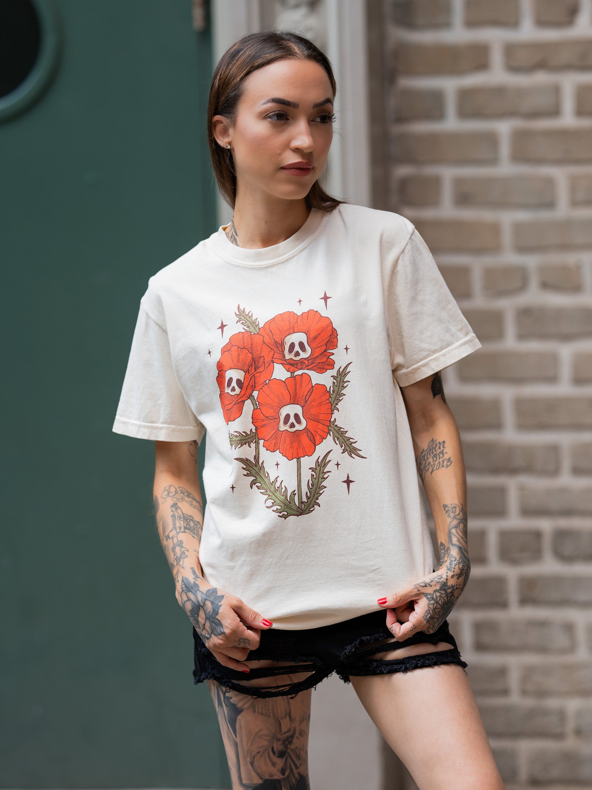 Janice Danger wearing a unisex, off white skull flowers t-shirt 