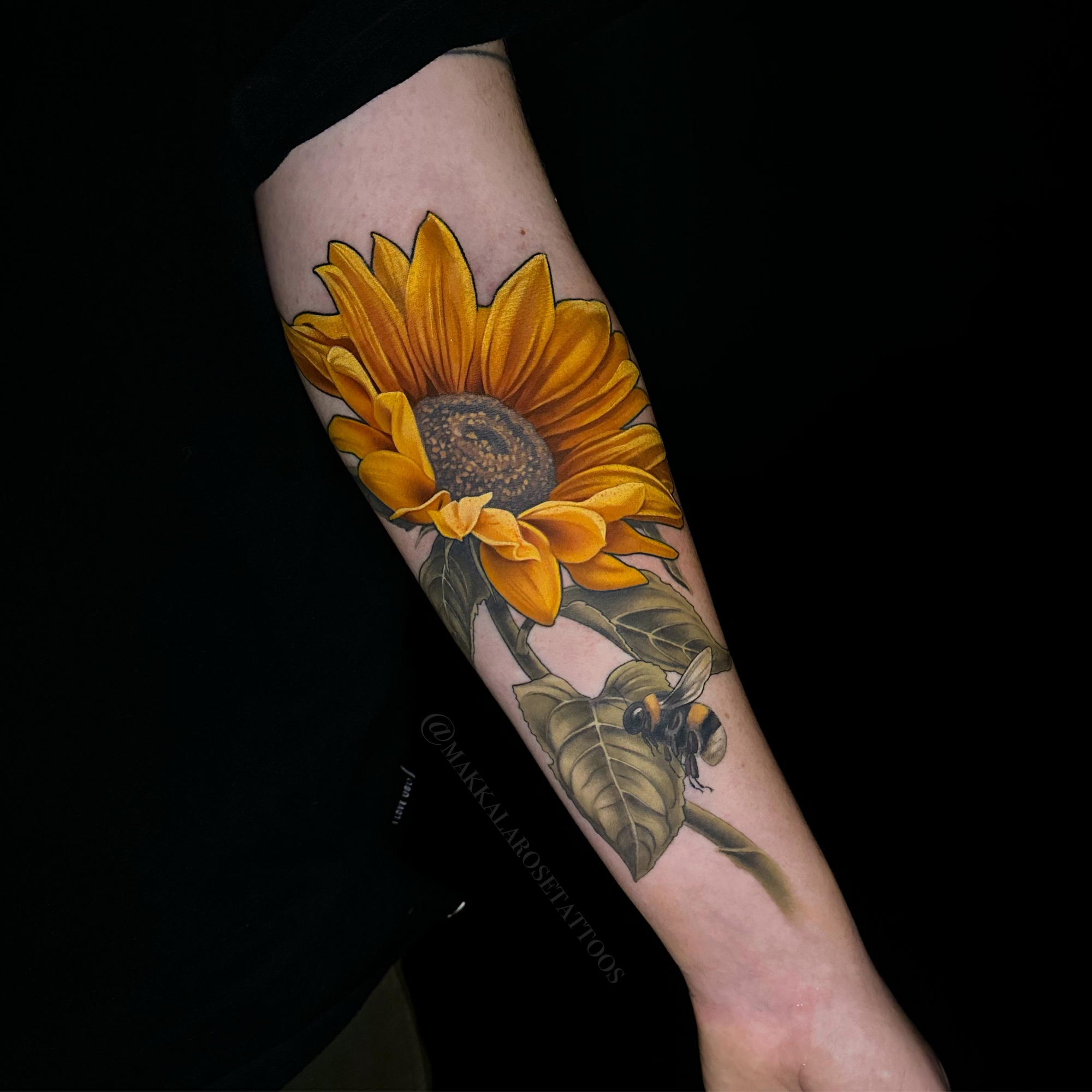 Sunflower and bee color forearm tattoo by Makkala Rose