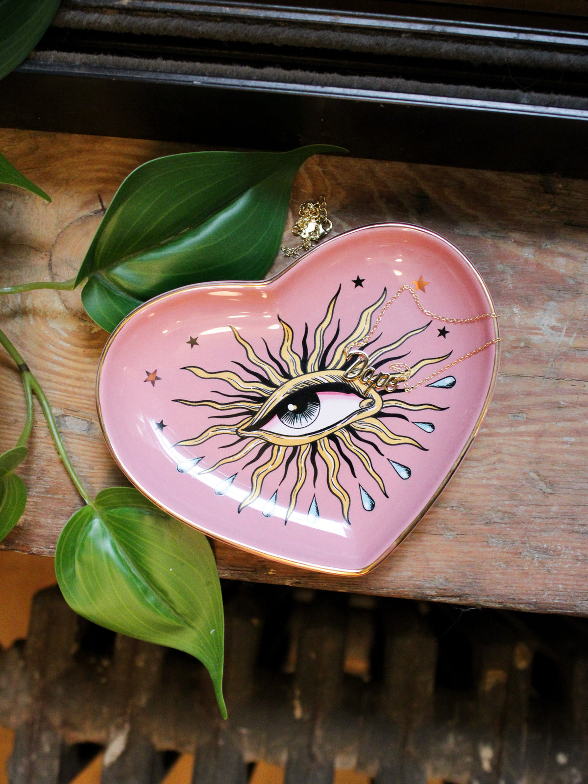 ceramic heart shaped, pink eye pop art dish. 