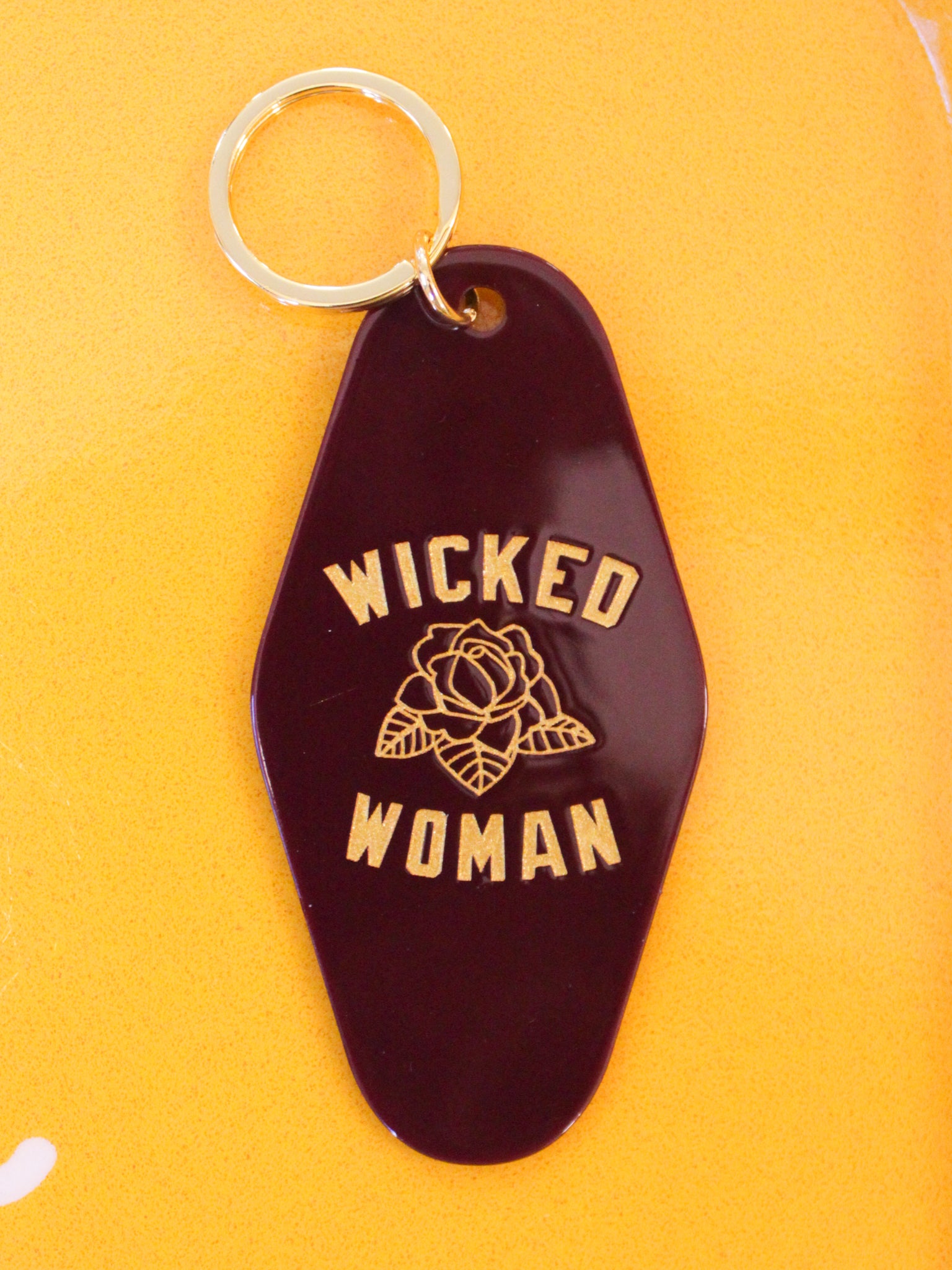 Deep red and yellow Wicked Woman keychain